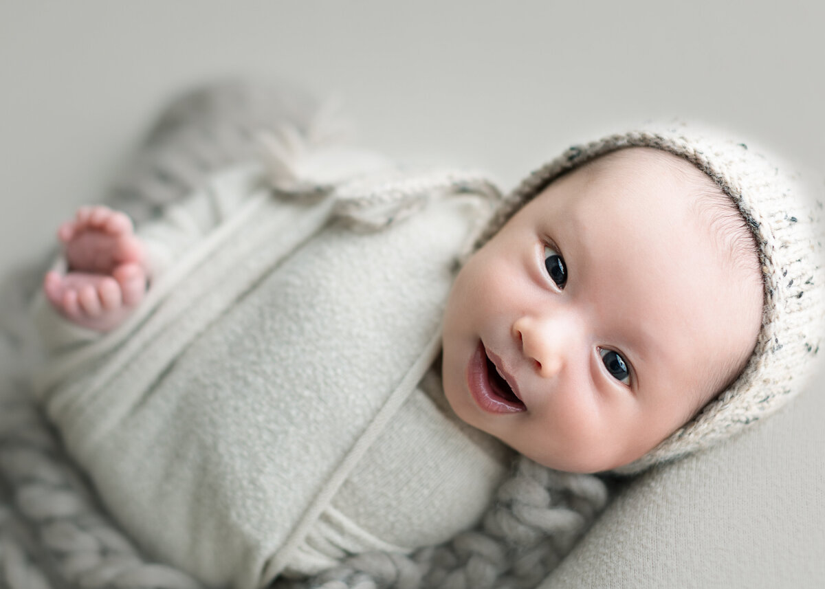 smiling newborn pictures in Denver Photo studio Erin Jachimiak Photography