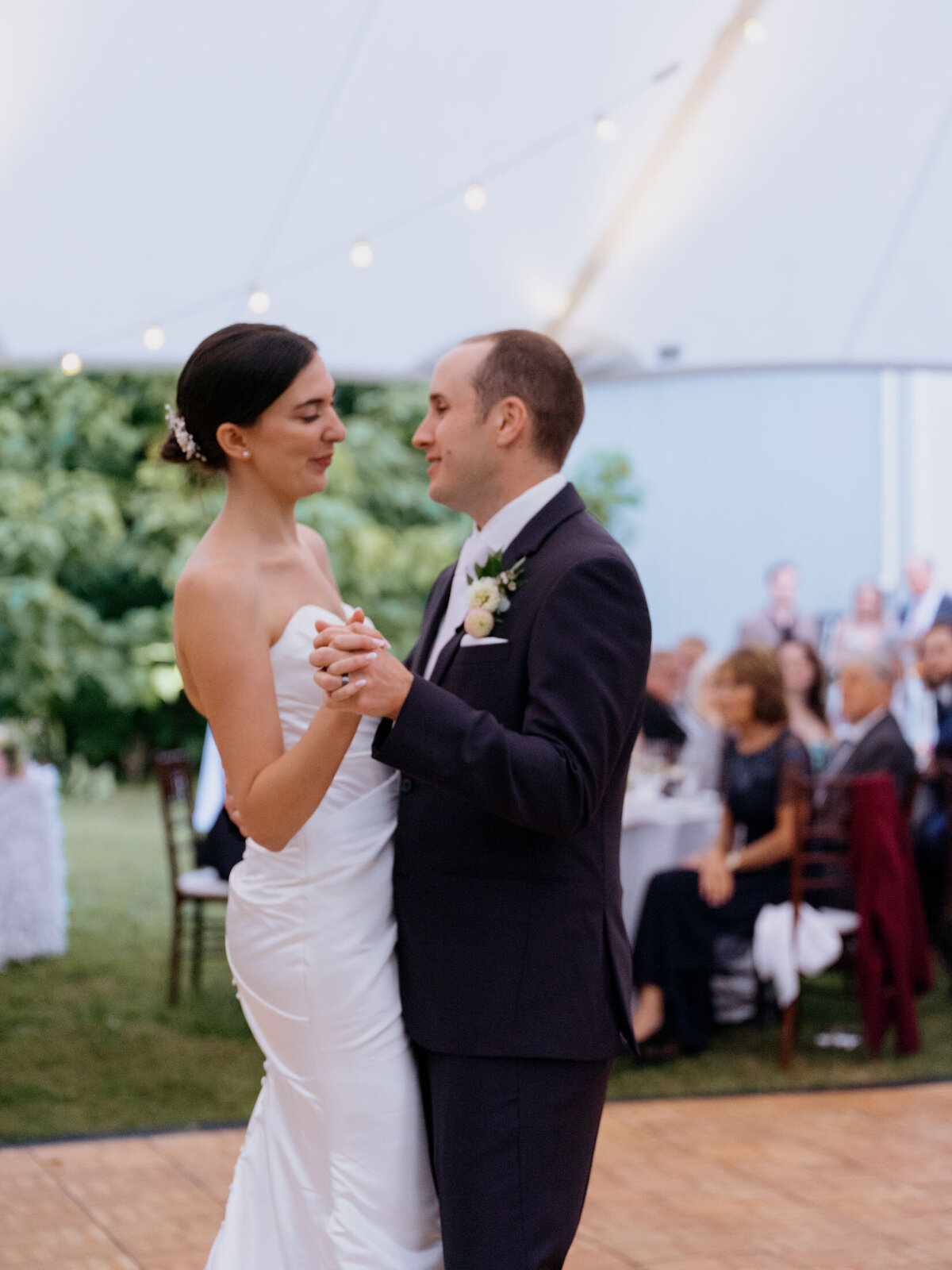 Elegant tented reception at private estate wedding.