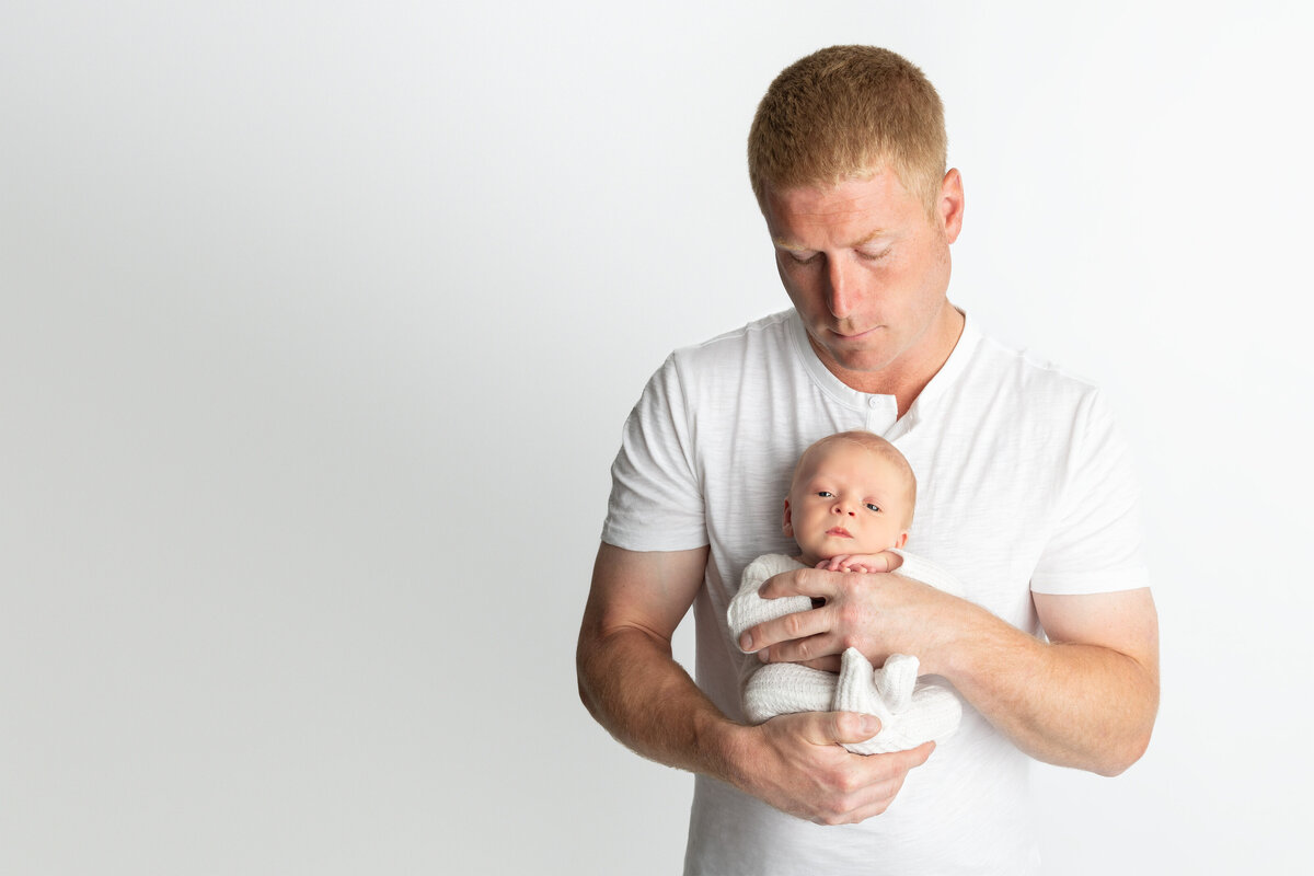Newborn studio portrait with father and baby boy – Paris, Ontario photographer