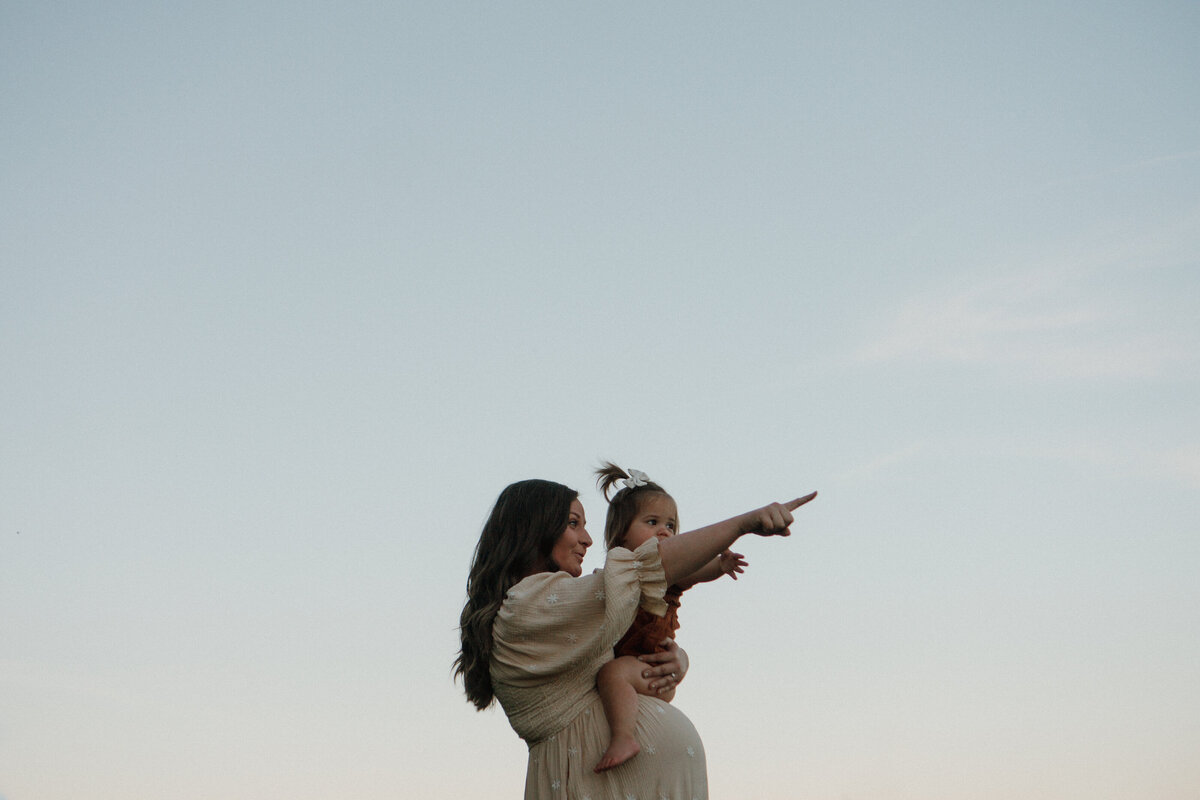 man spinning woman in circle