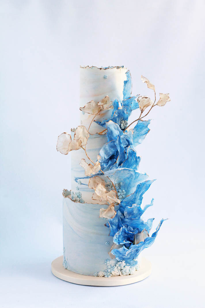 white and gold wedding cake with sugar flowers and wafer paper sails, Hamilton ON wedding cakes