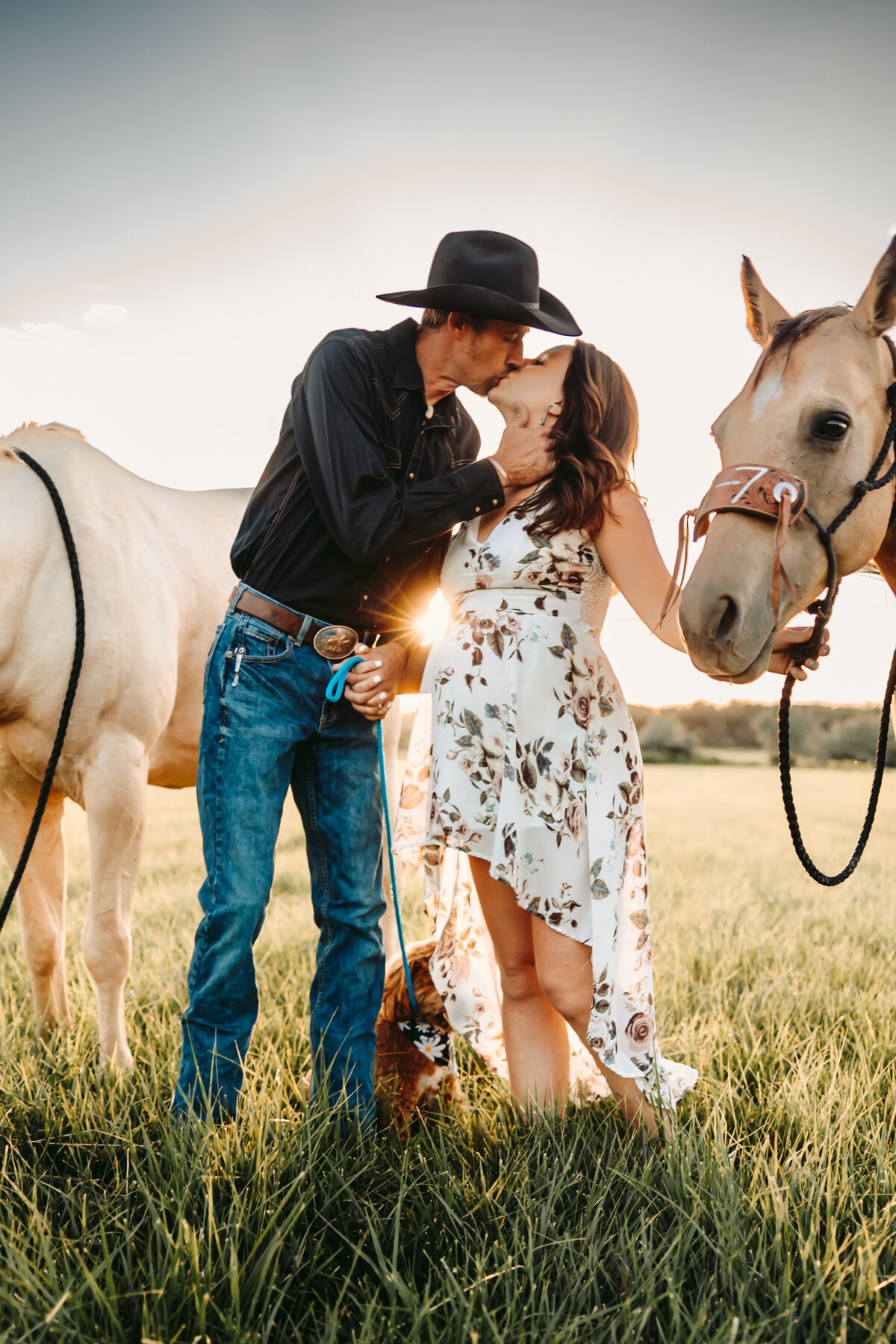 Couple poses with their horses for  Telluride maternity pictures.