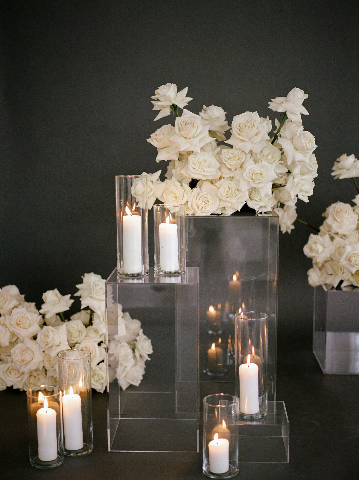 abundant blush white roses with dark background, florist branding photo