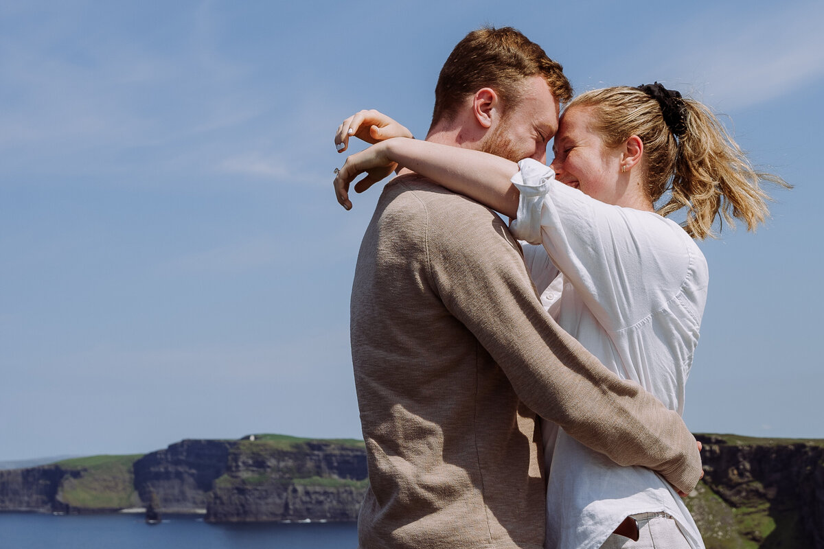 couple hugging outside