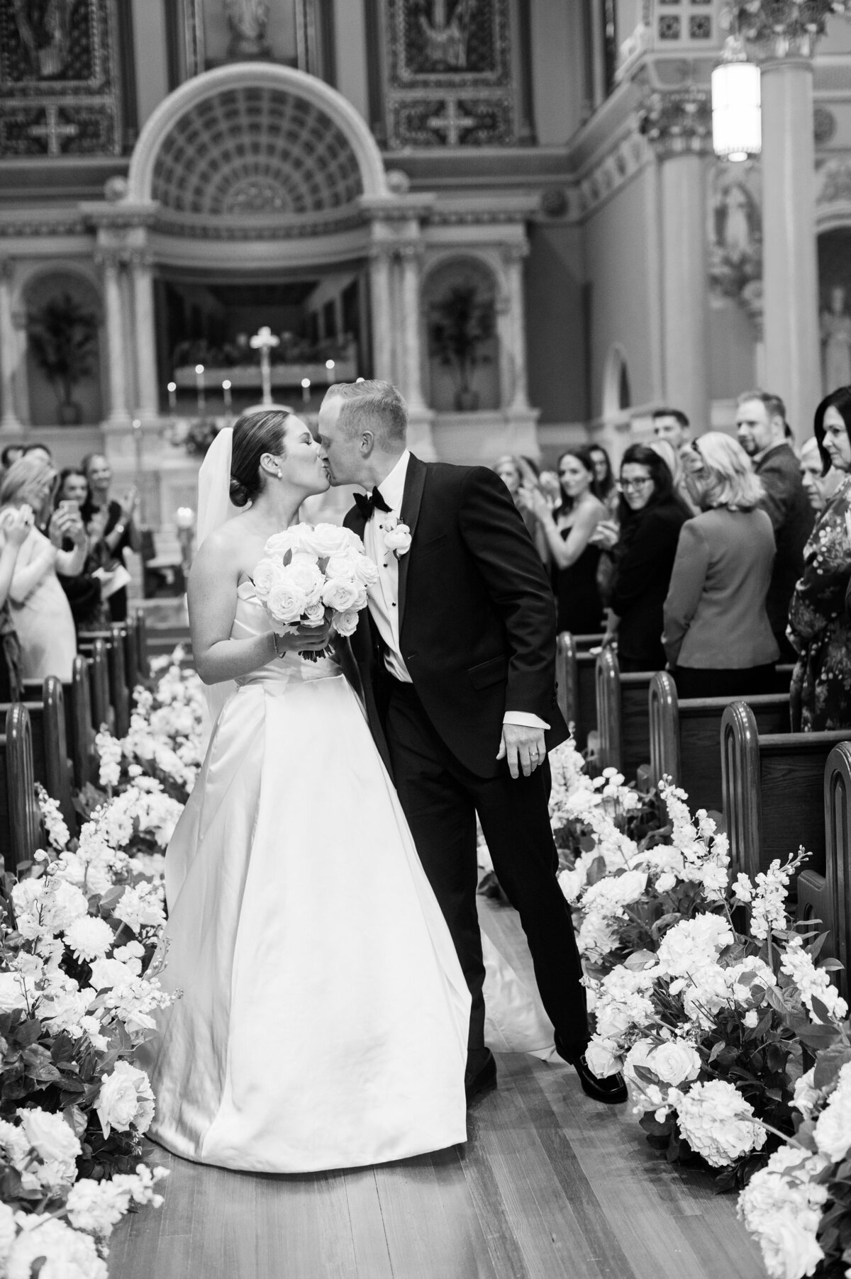 Kate-Murtaugh-Events-Boston-wedding-aisle-kiss