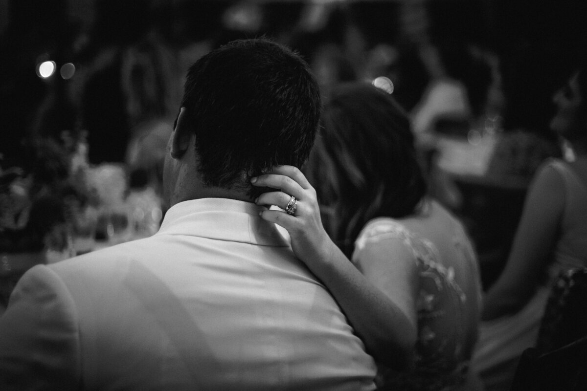 bride and groom sitting at the dinner table