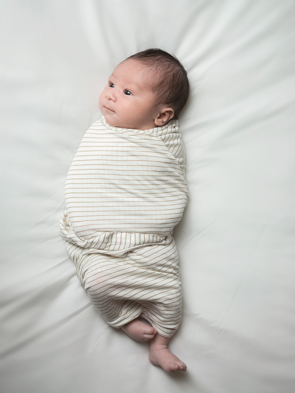 Simple in-home newborn photo with soft window light — San Francisco Bay Area baby photographer