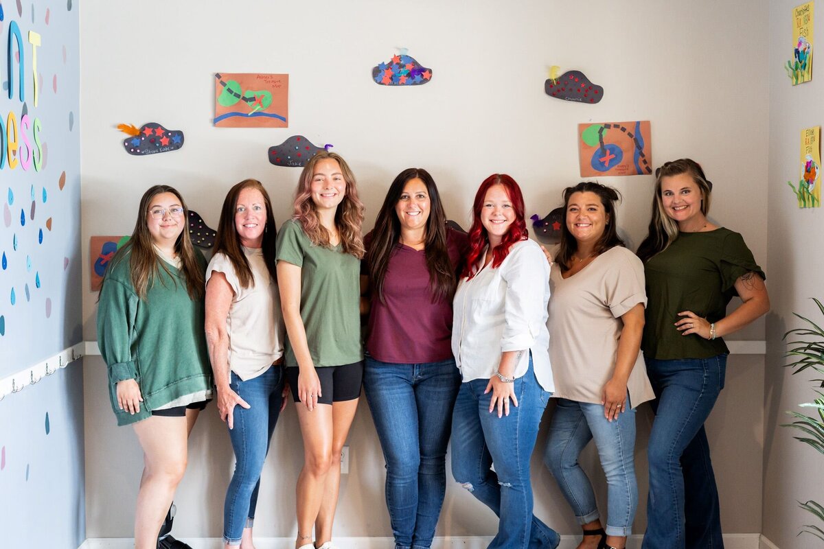Team photo of all of the teachers and staff at the Nest, a preschool and learning center in Surf City, NC