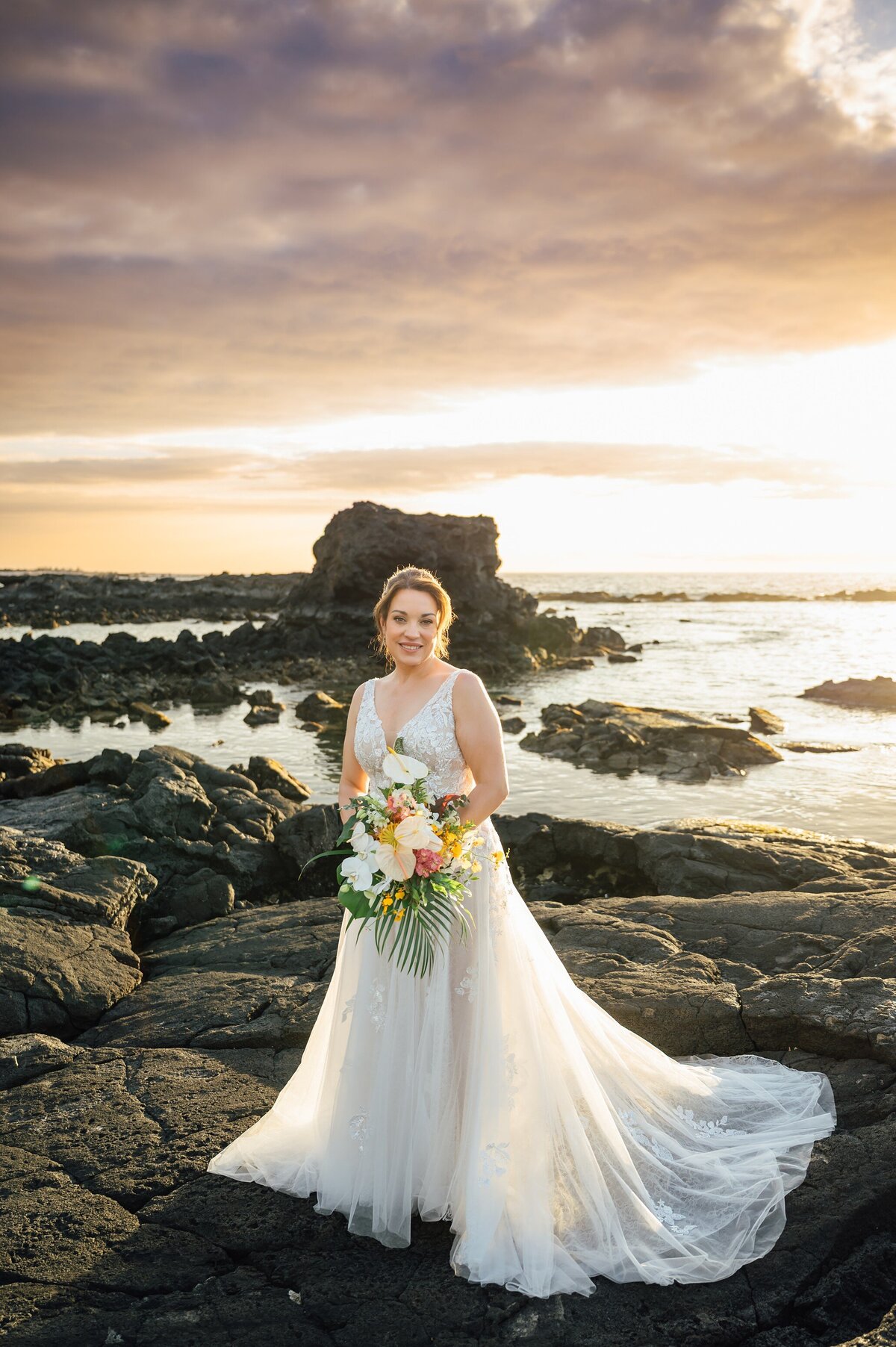 beautiful bride on the lava rocks in Hawaii
