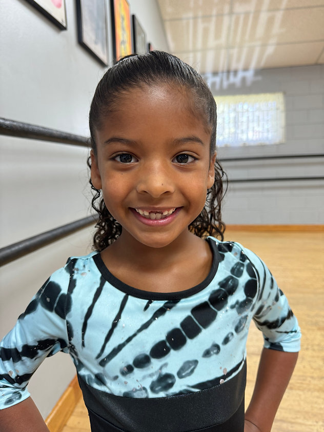 A little girl after she started her solo