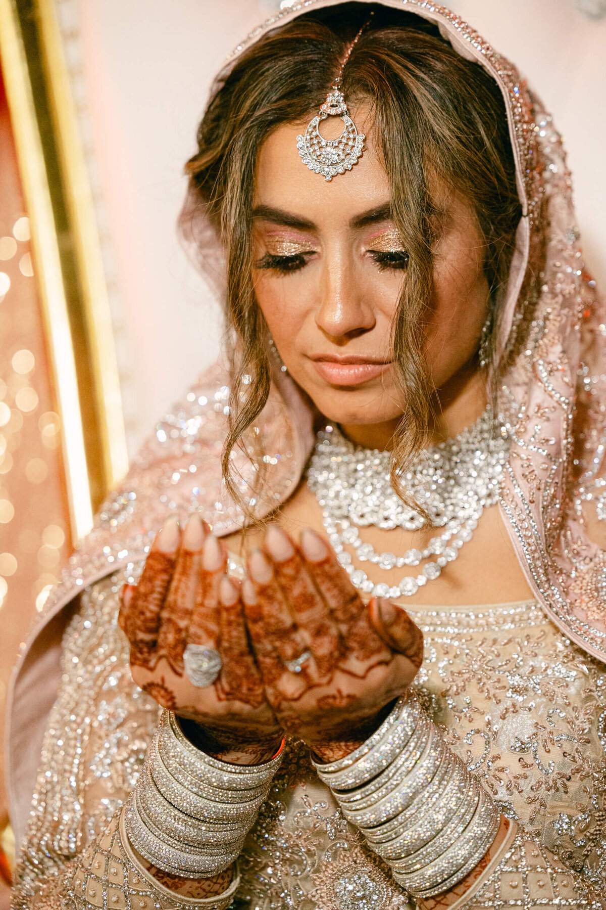 A wedding photo of the bride praying in Dublin Ireland