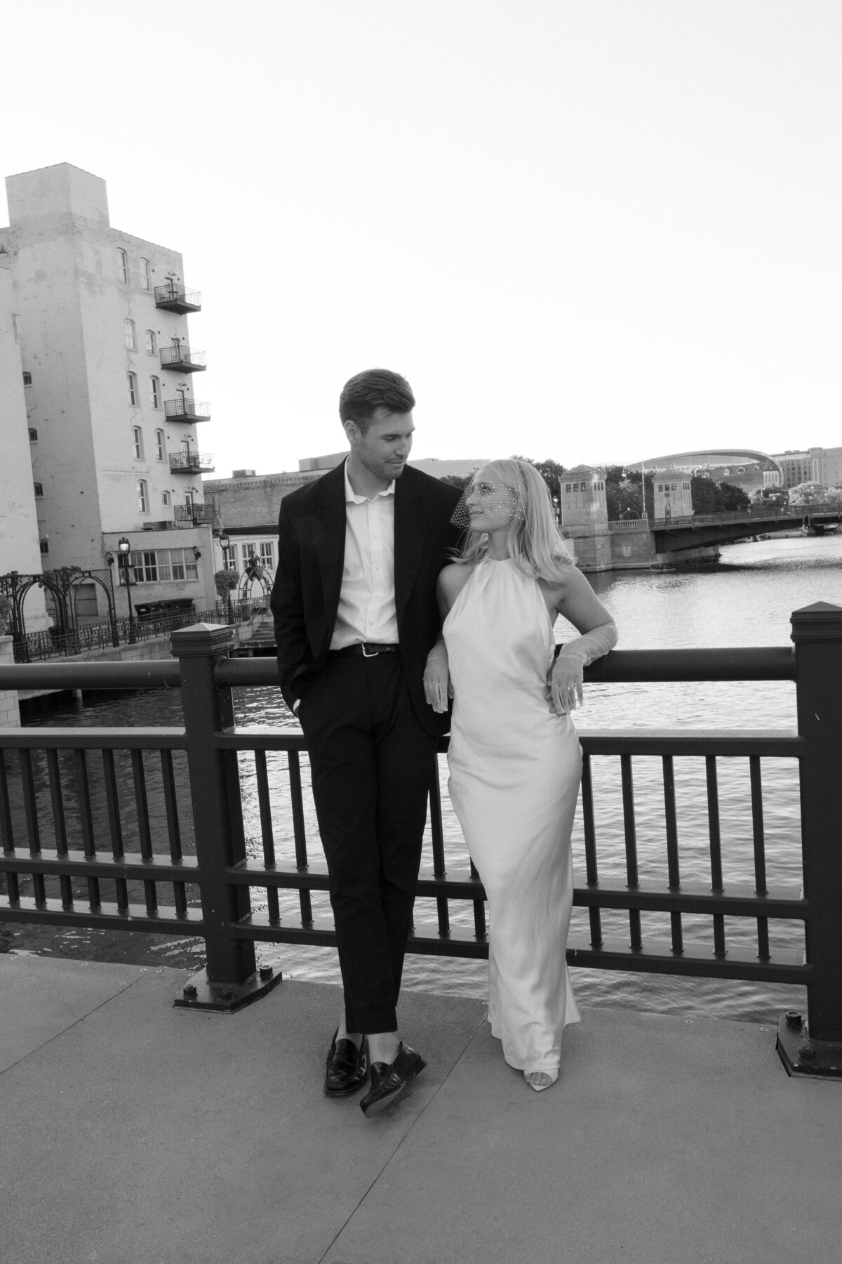 Beautiful portraits of the bride and groom captured in downtown Madison, showcasing the city's charming architecture and vibrant atmosphere as the backdrop for their love.