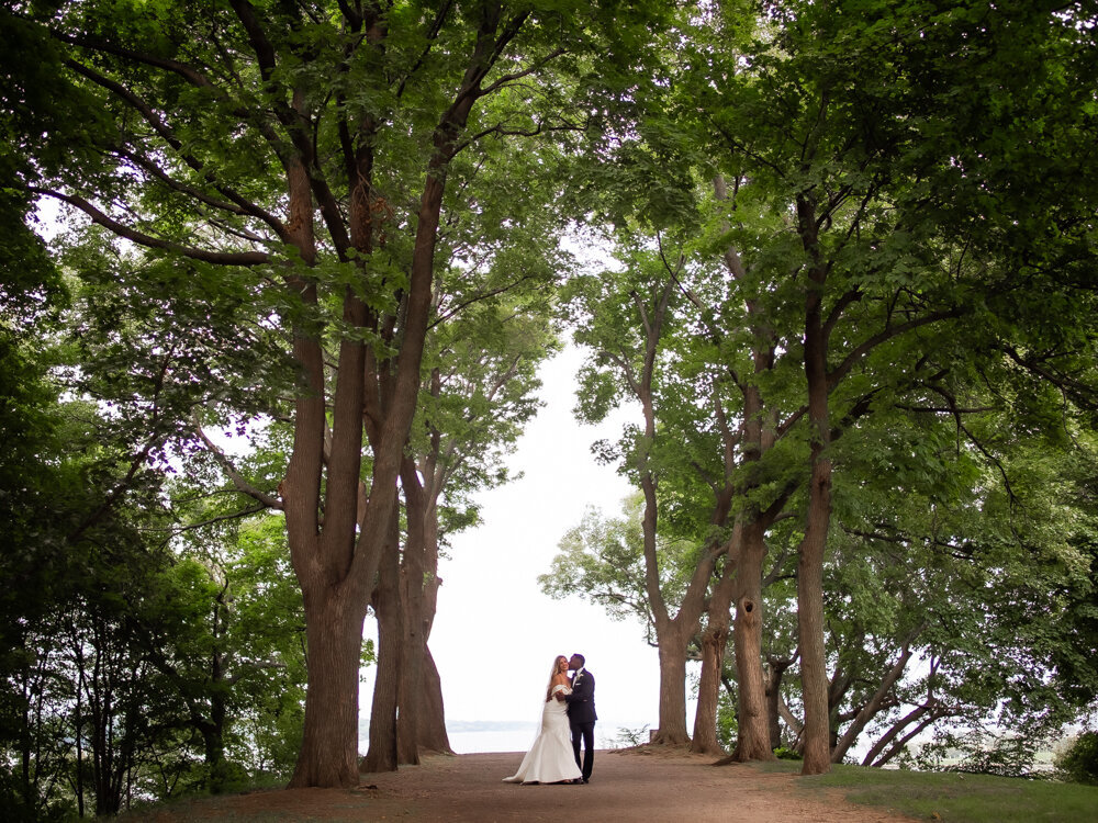 bride groom with waterfront background