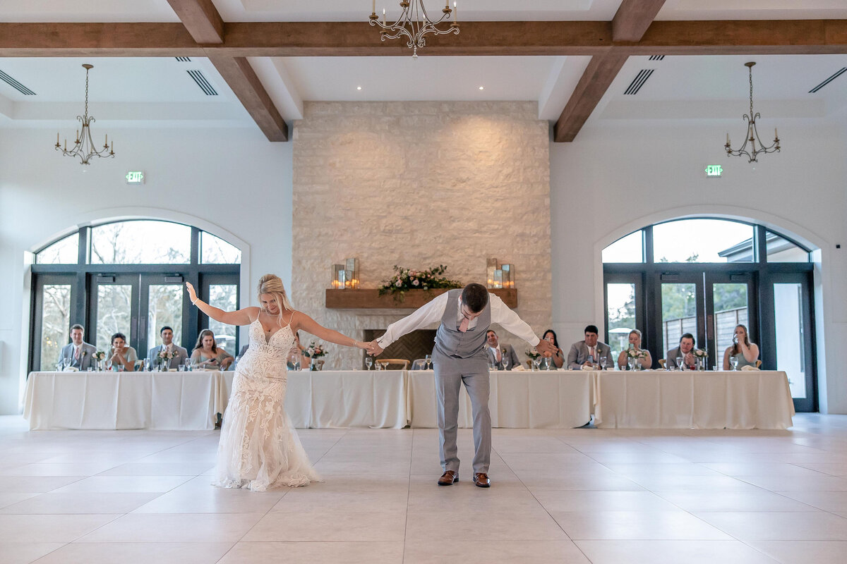 bride and groom bow after choreographed dance at The Preserve at Canyon Lake