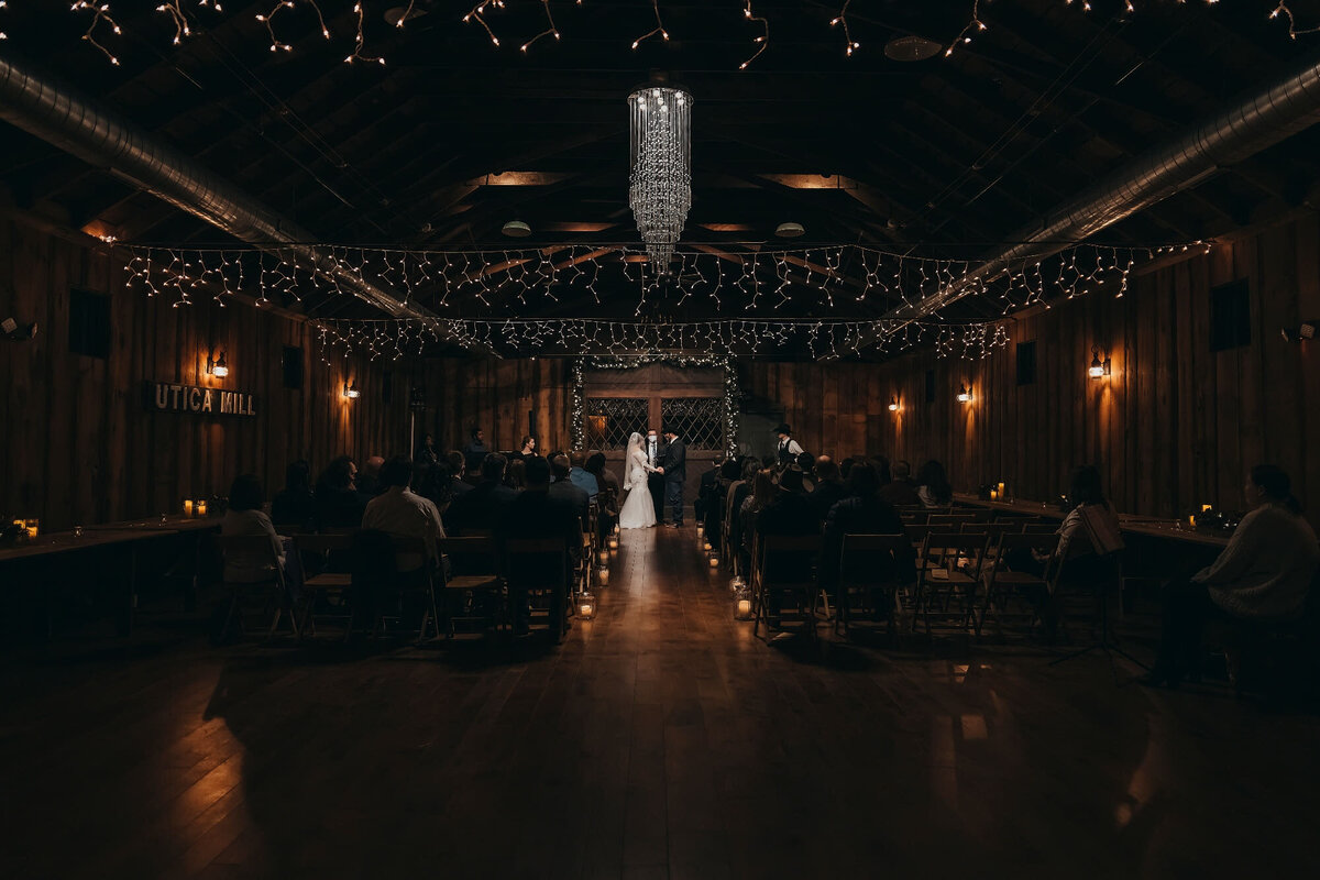 moody indoor wedding ceremony