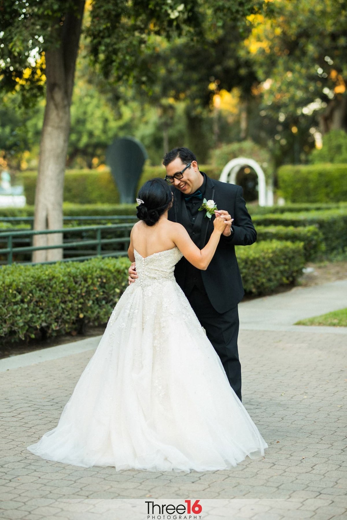 Bride and Groom share their first dance together at Heritage Park in Santa Fe Springs