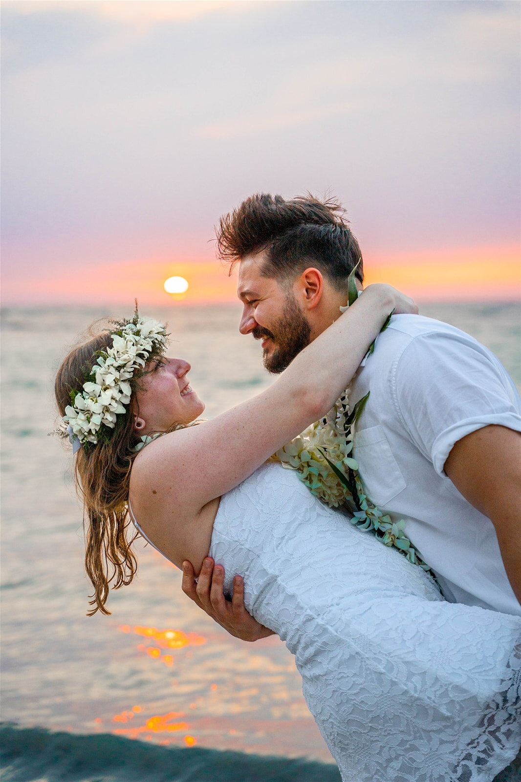 Couple portraits at sunset on the big island, taken by kona hawaii wedding photographers
