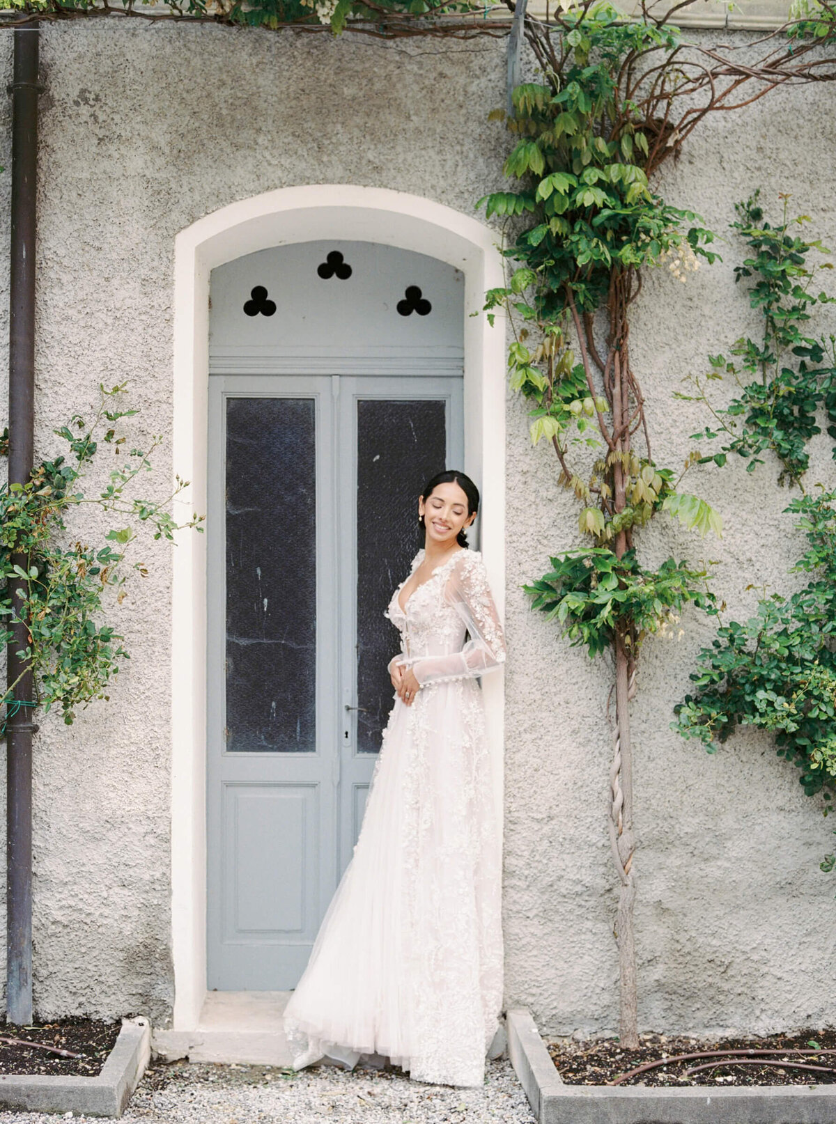 A wedding day bridal shot of a bride in her white dress at Villa Aura del Lago on lake como in Italy