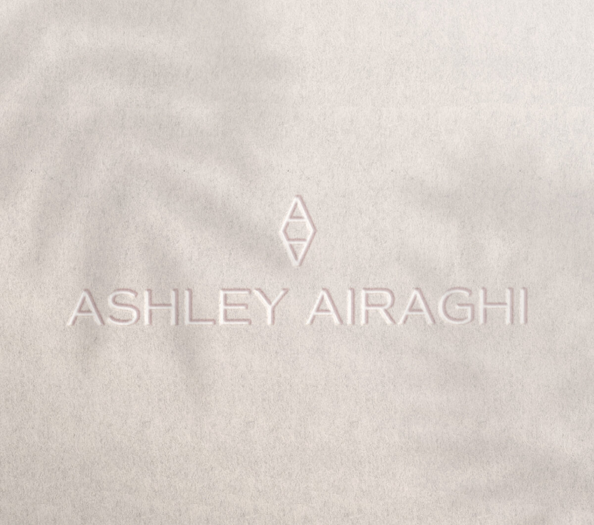 AshleyAiraghi-EmbossedLogo2