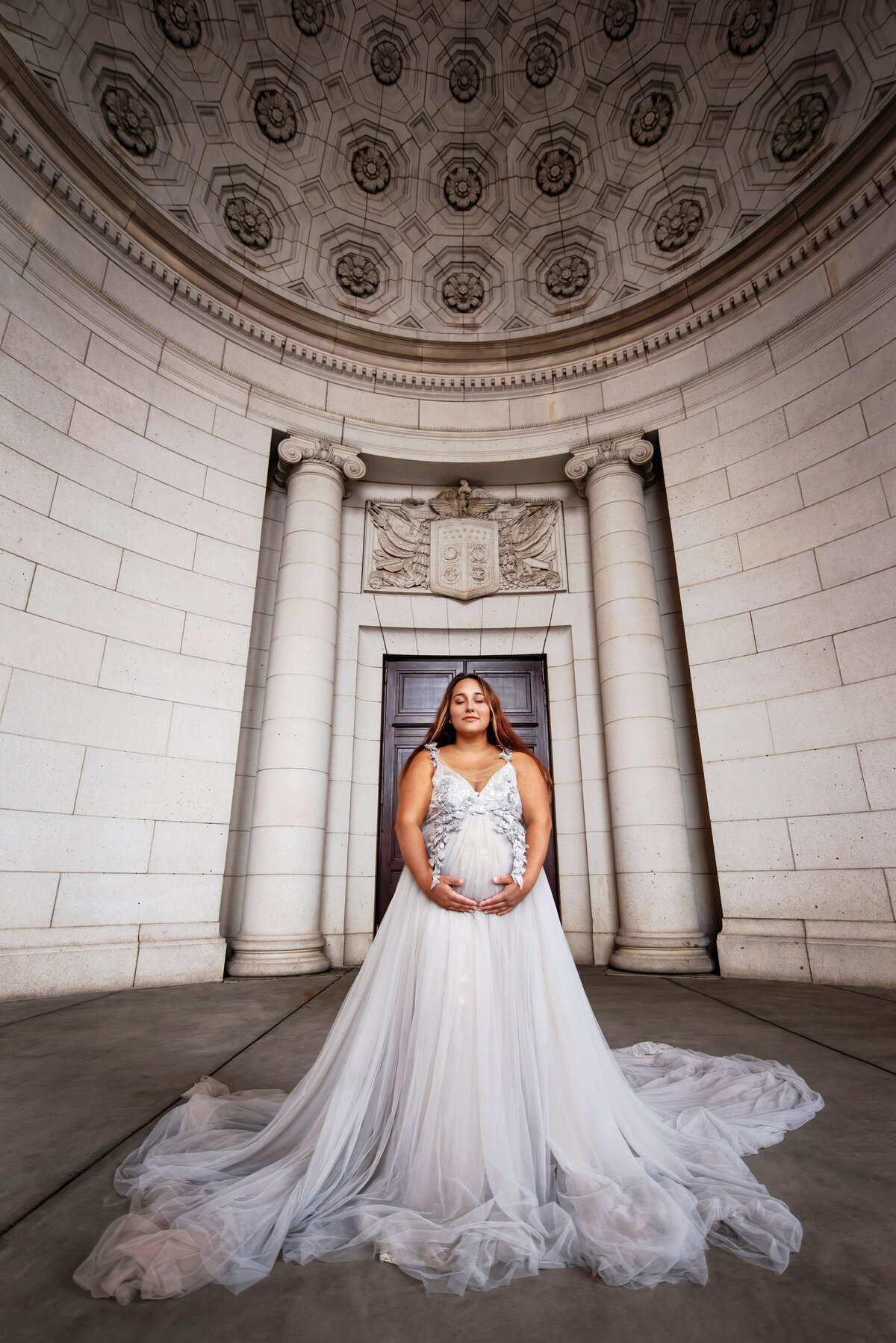 washington-dc-maternity-photographer-expecting-mom-in-fluffy-gray-tulle-gown-with-wide-angle-at-dc-union-station