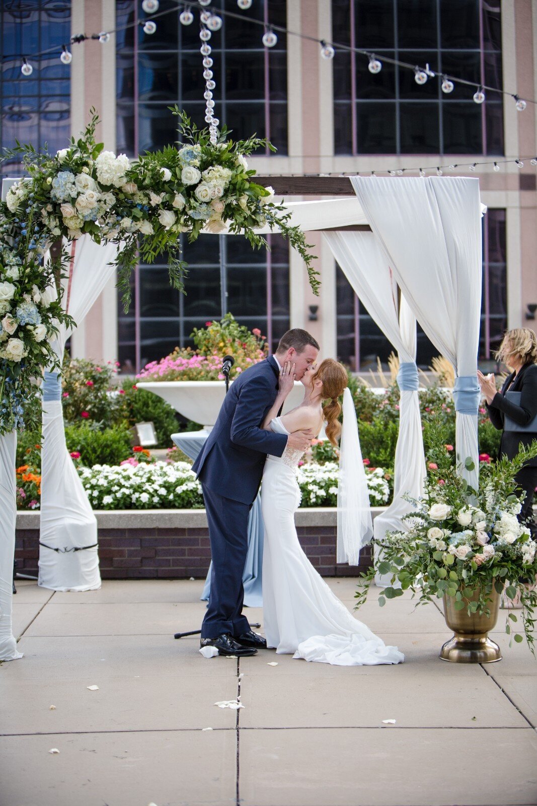 jps-events-indianapolis-jewish-wedding-first-kiss-under-chuppah.jpg