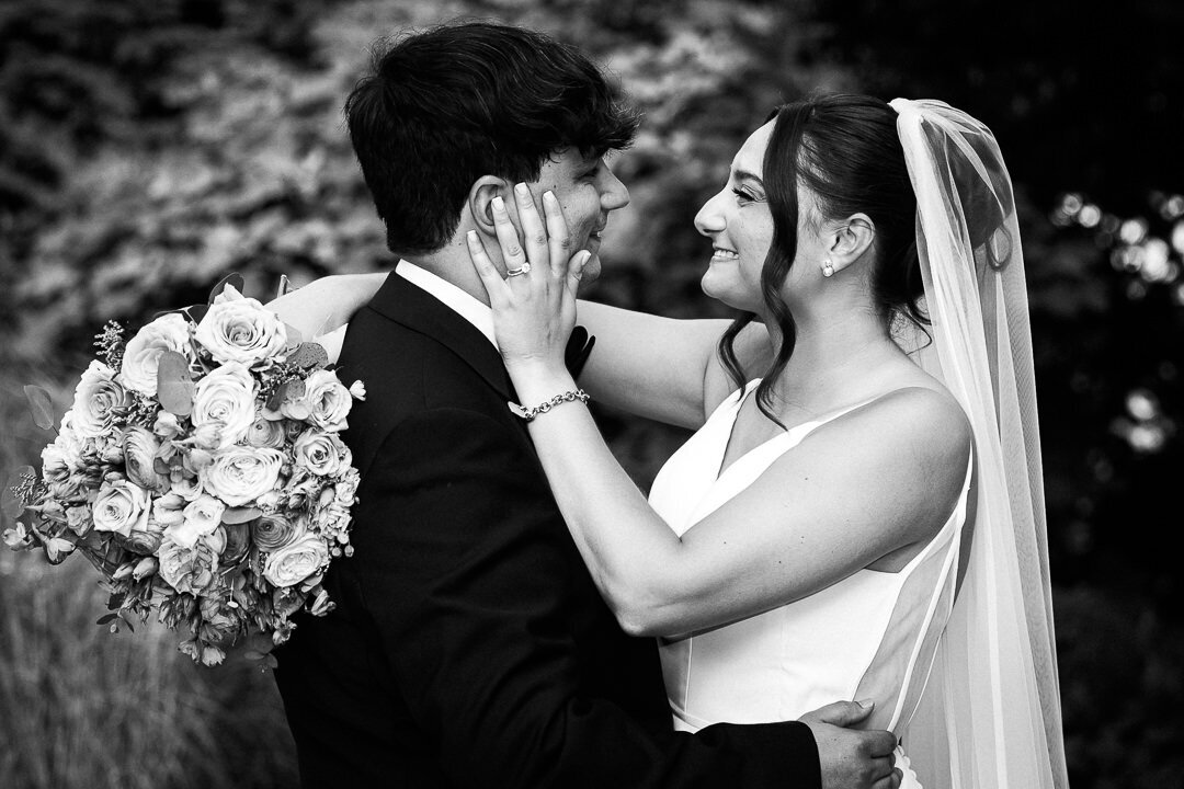 black-and-white-wedding-photo-bride-groom-embrace-nj-by-alex-kaplan