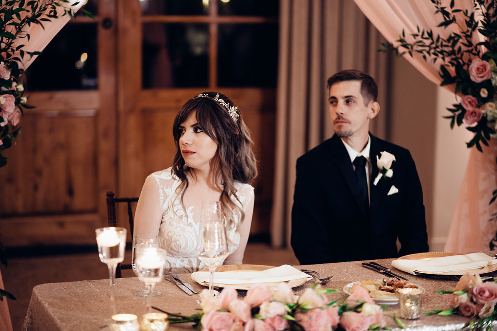 Wedding Photograph Of Bride And Groom Sitting Los Angeles