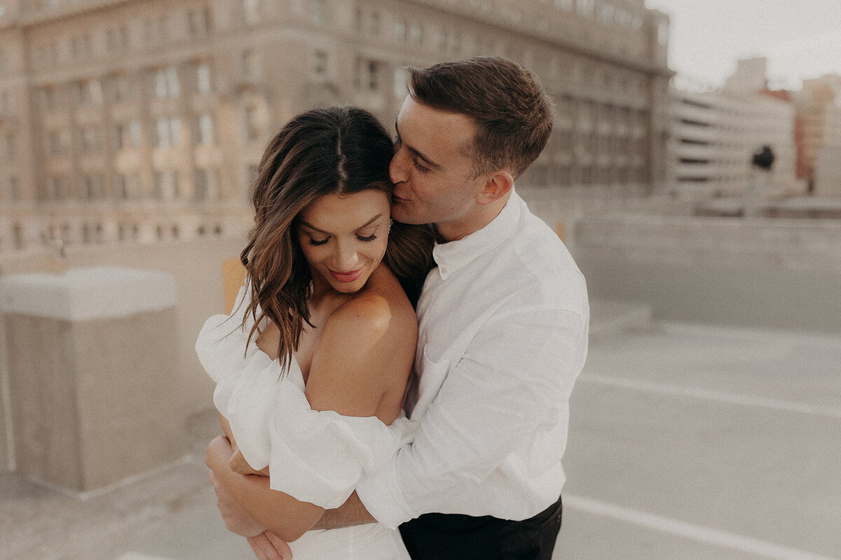 An inDancing in the streets of downtown omaha for this editorial style engagement sessiontimate engagement session with A+J at the Hotel Deco in downtown Omaha