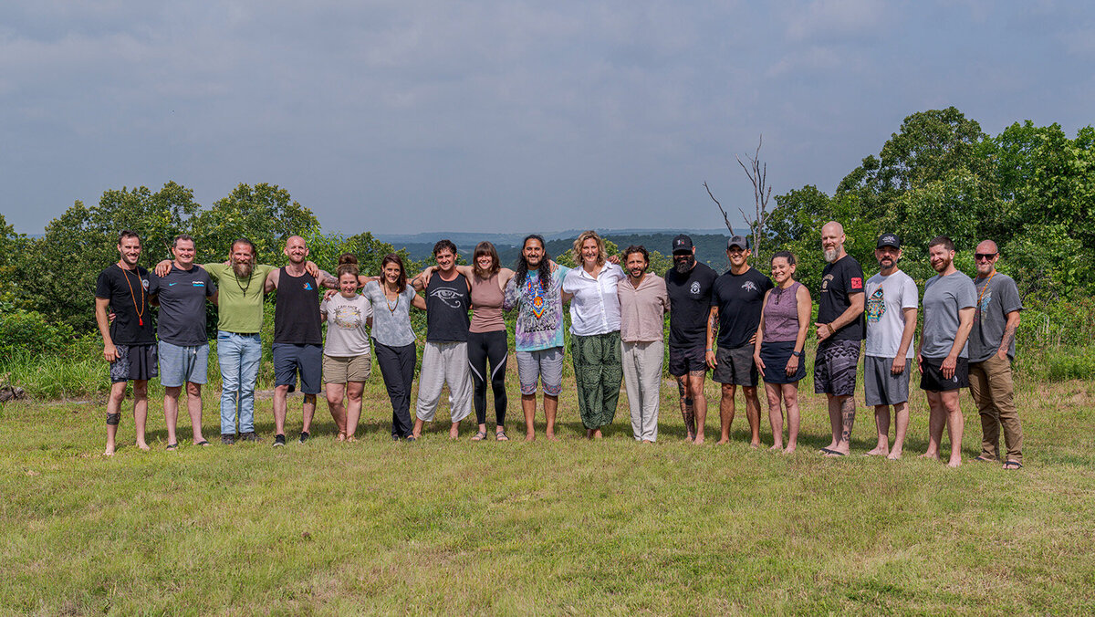 A group photo of a recent veteran only retreat hosted by Rising Ridge.