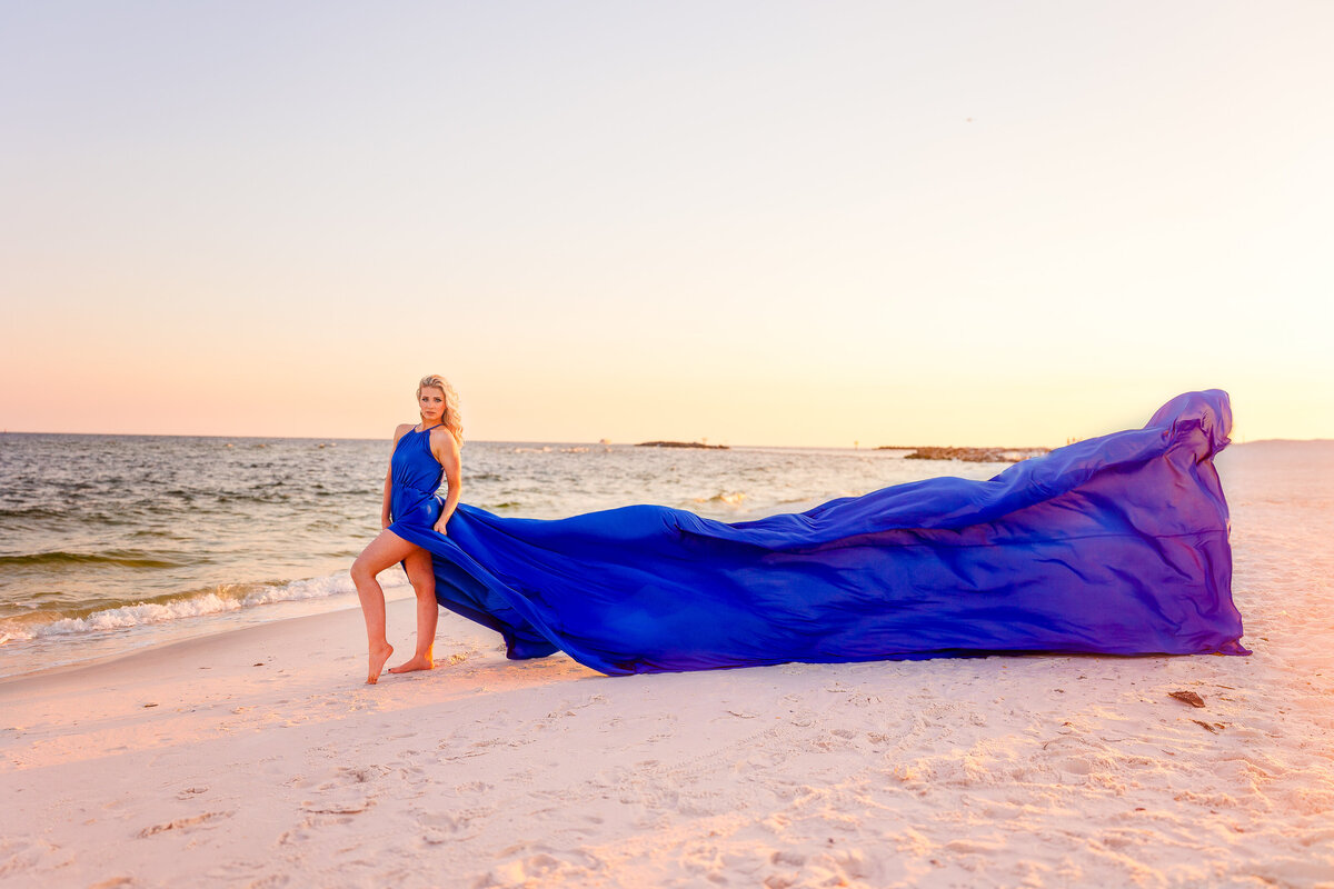 Sunset, sand, golden hour and a blue flying dress with Michelle Law Photography