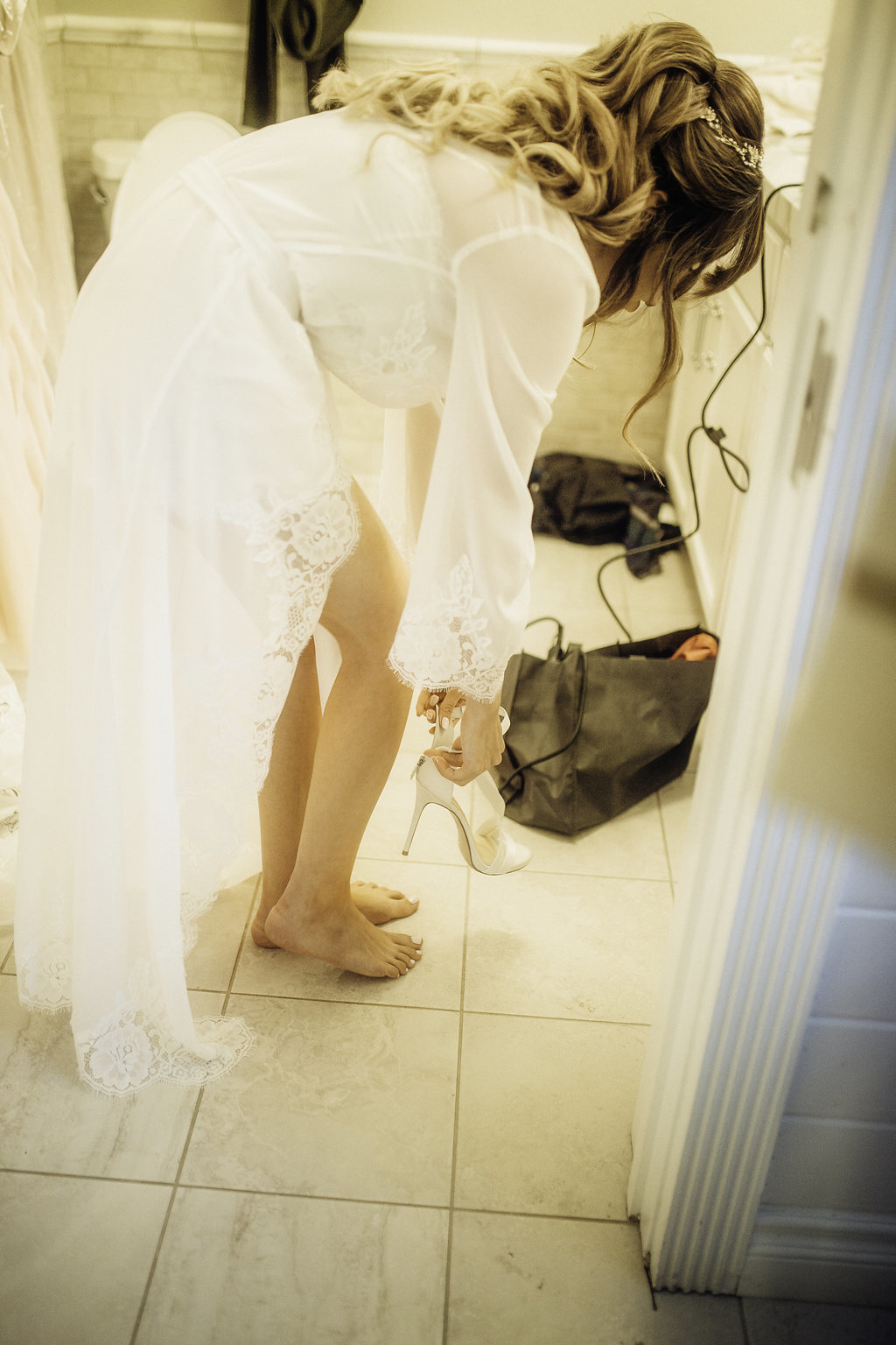 Wedding Photograph Of Woman in White Dress Wearing Sandals Los Angeles
