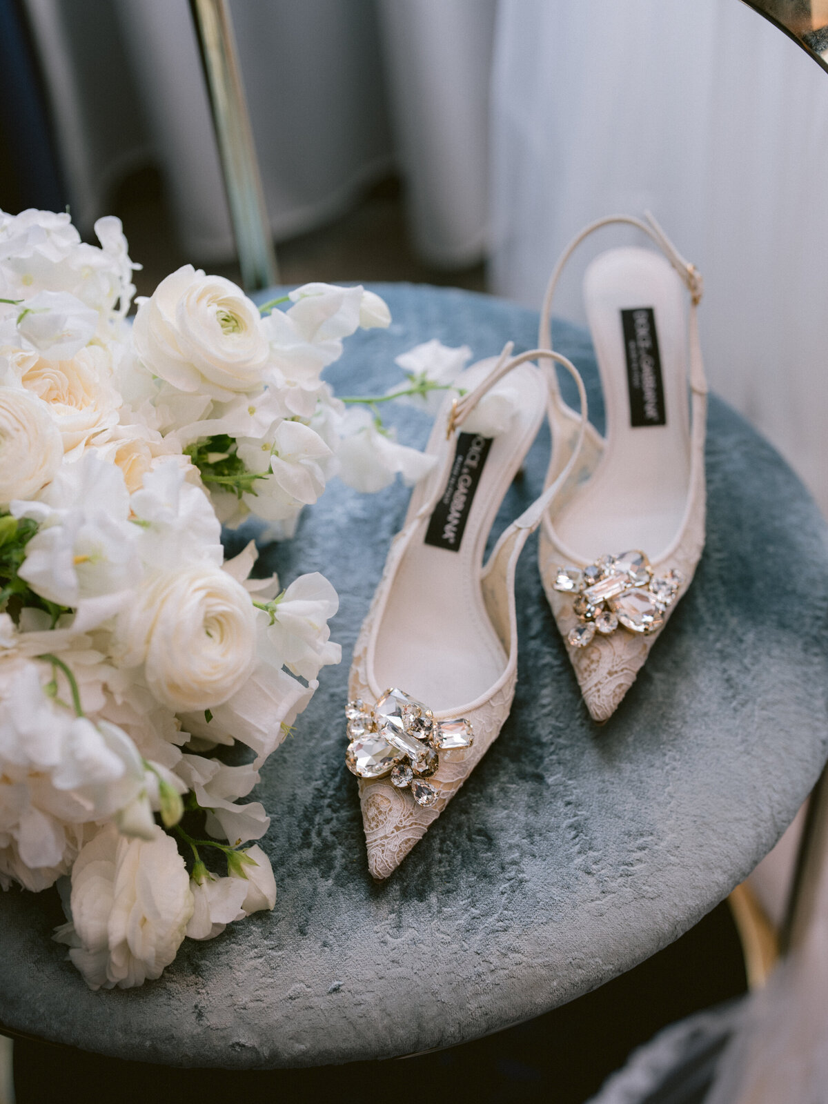 Brides wedding shoes and classic bouquet_top luxury wedding planner in US