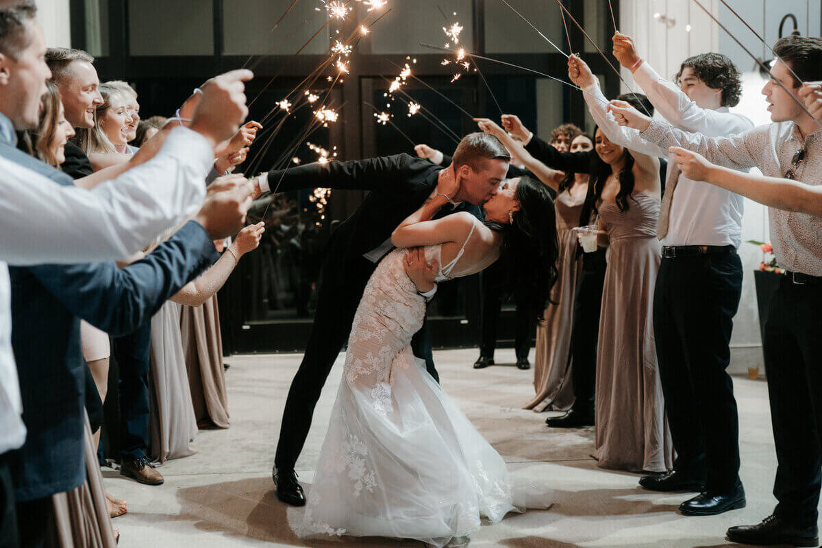 Bride and groom kissing planned by wedding planners in chicago