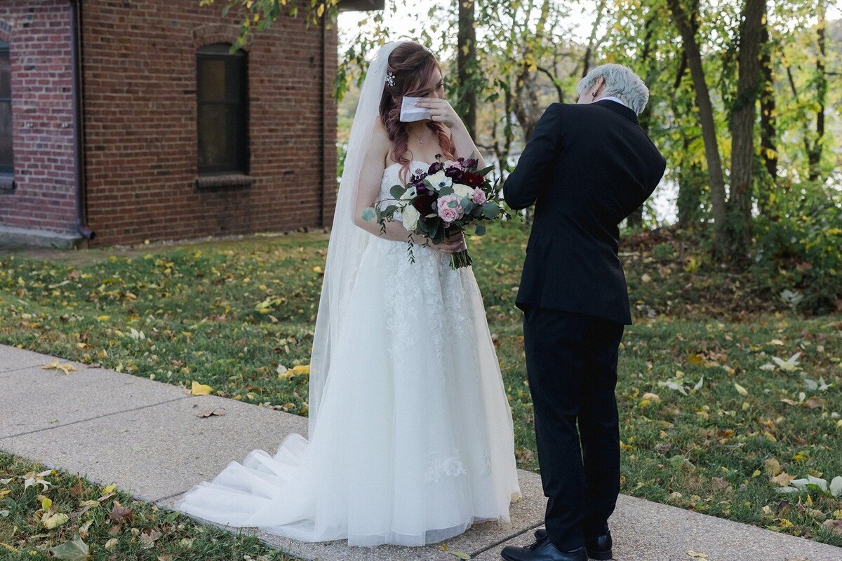 Emotional moments of bride and grooms first look