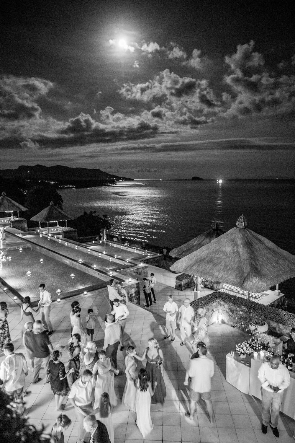 destination-wedding-bali-amankila-ocean-front-moonlight-dancing-reception-pool