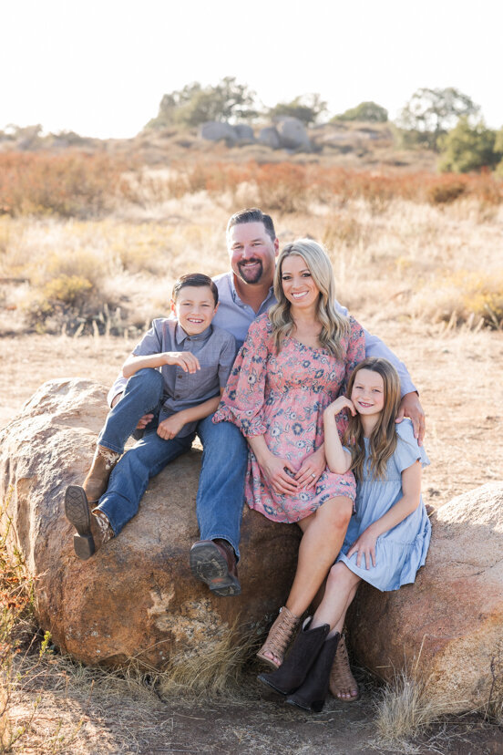 san-diego-family-portrait-sitting-on-rock-wrights-field