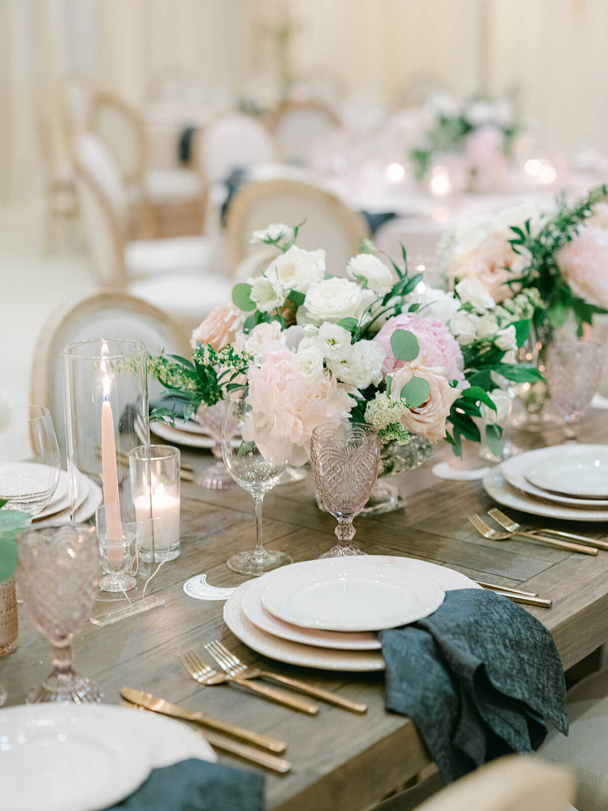Custom teal and blush place settings at a Boulder, Colorado wedding