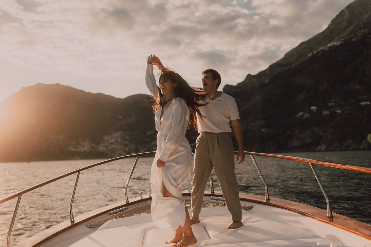 couple of photo on their elopement day on a boat