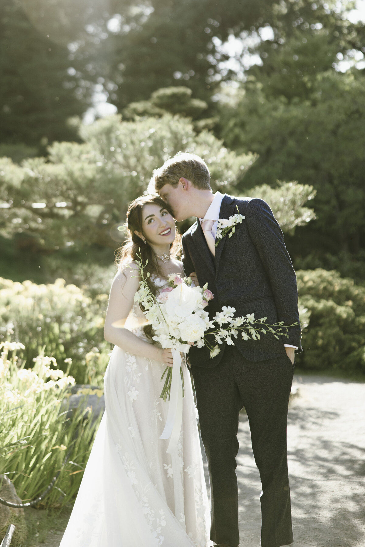 Bride and Groom posing in tea garden