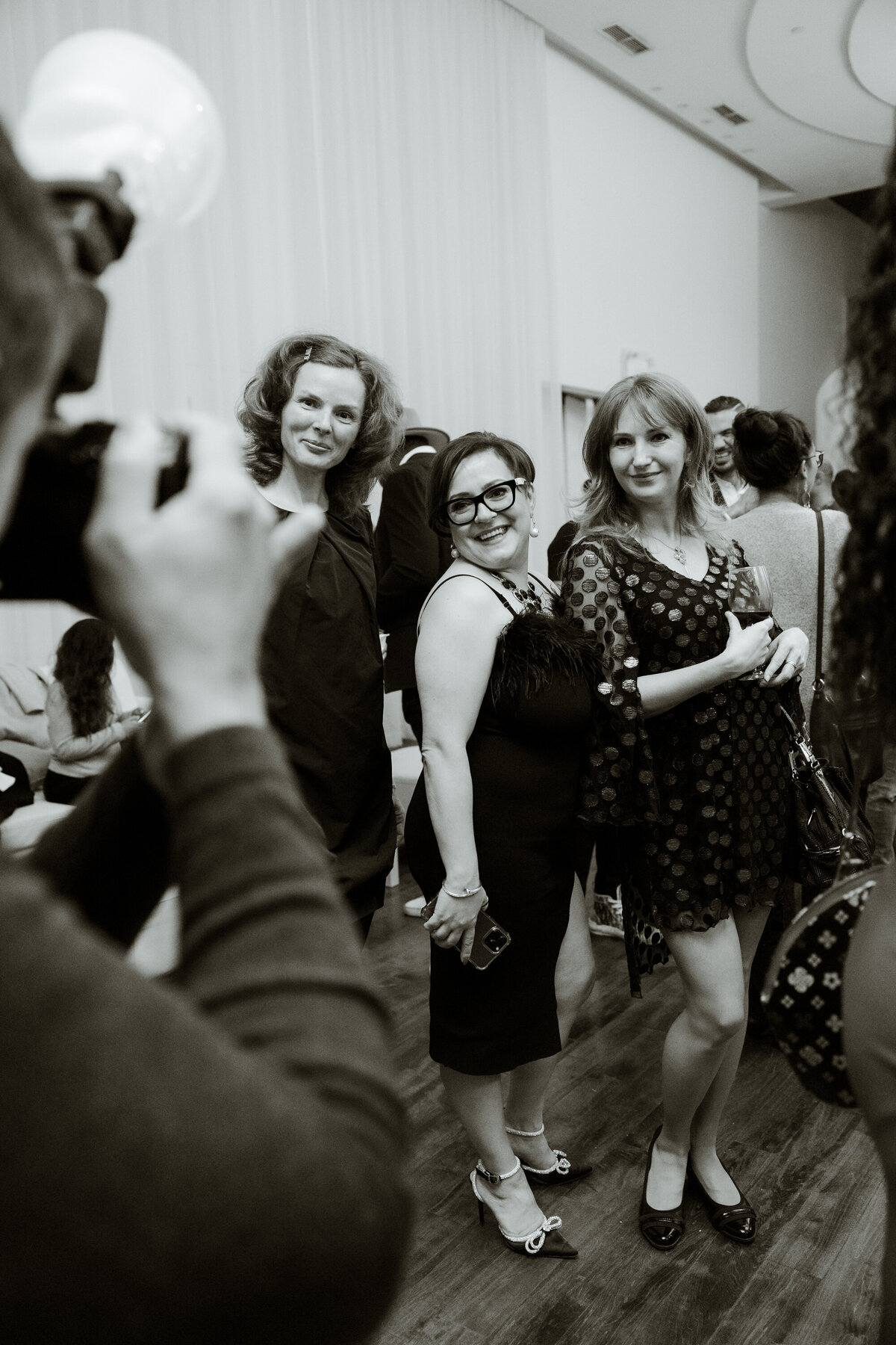 Ladies posing at the Montreal Cosmopolitan Fashion Week Welcome Cocktail