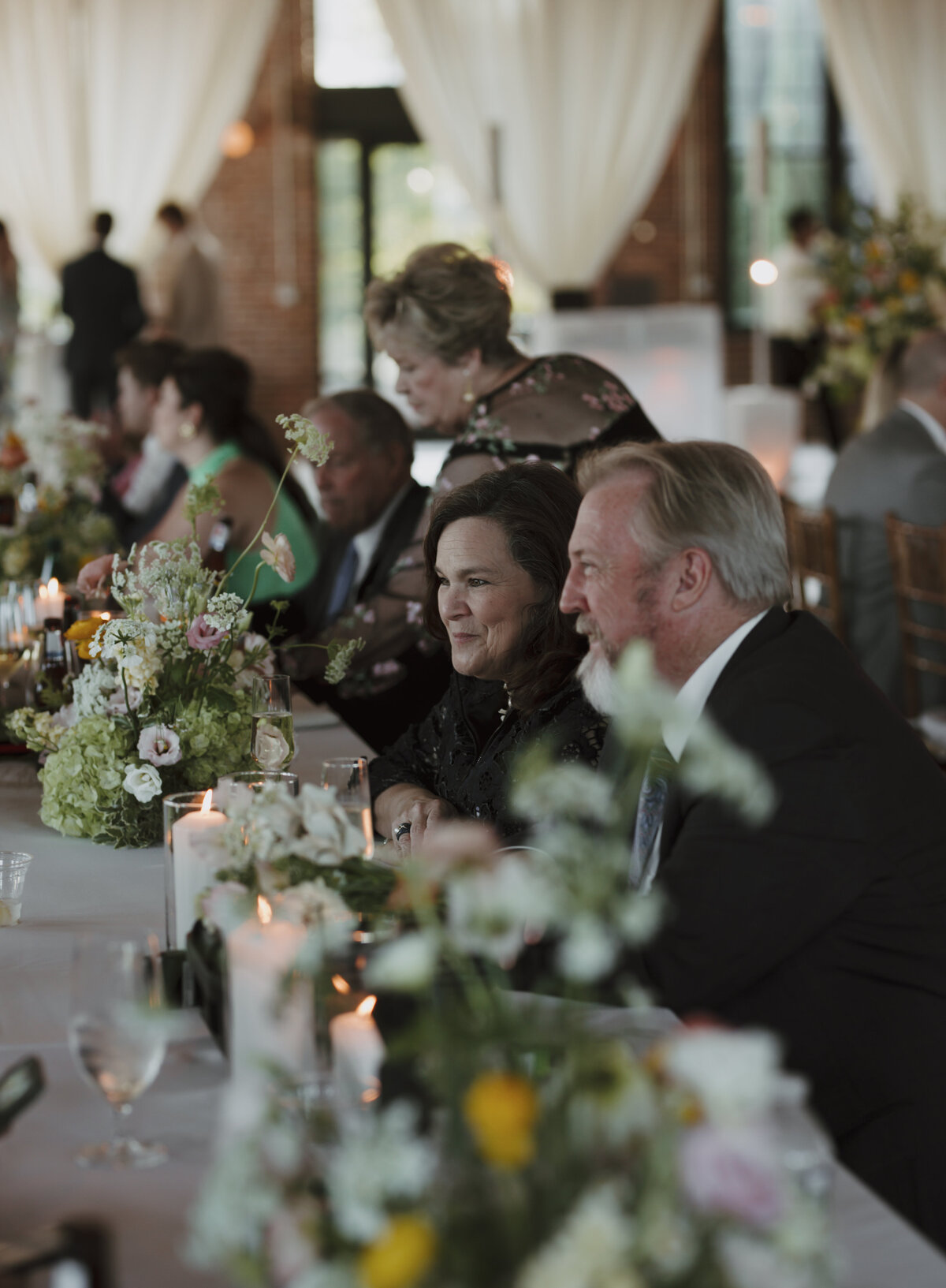 guests chatting at dinner