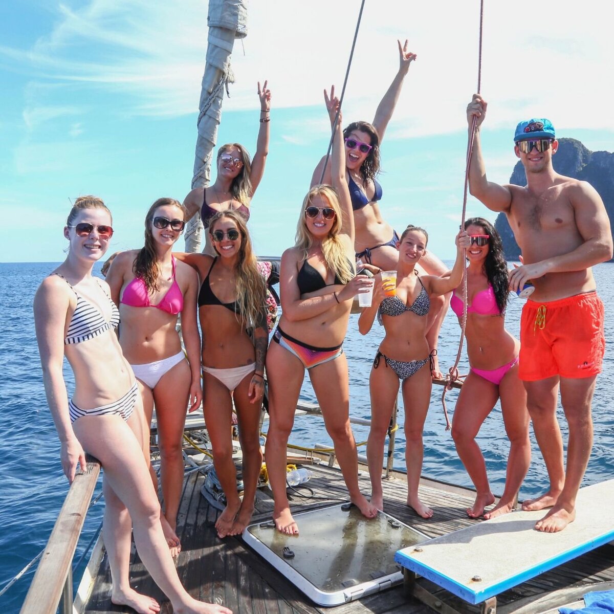 group of people on a sail boat while on a yoga retreat