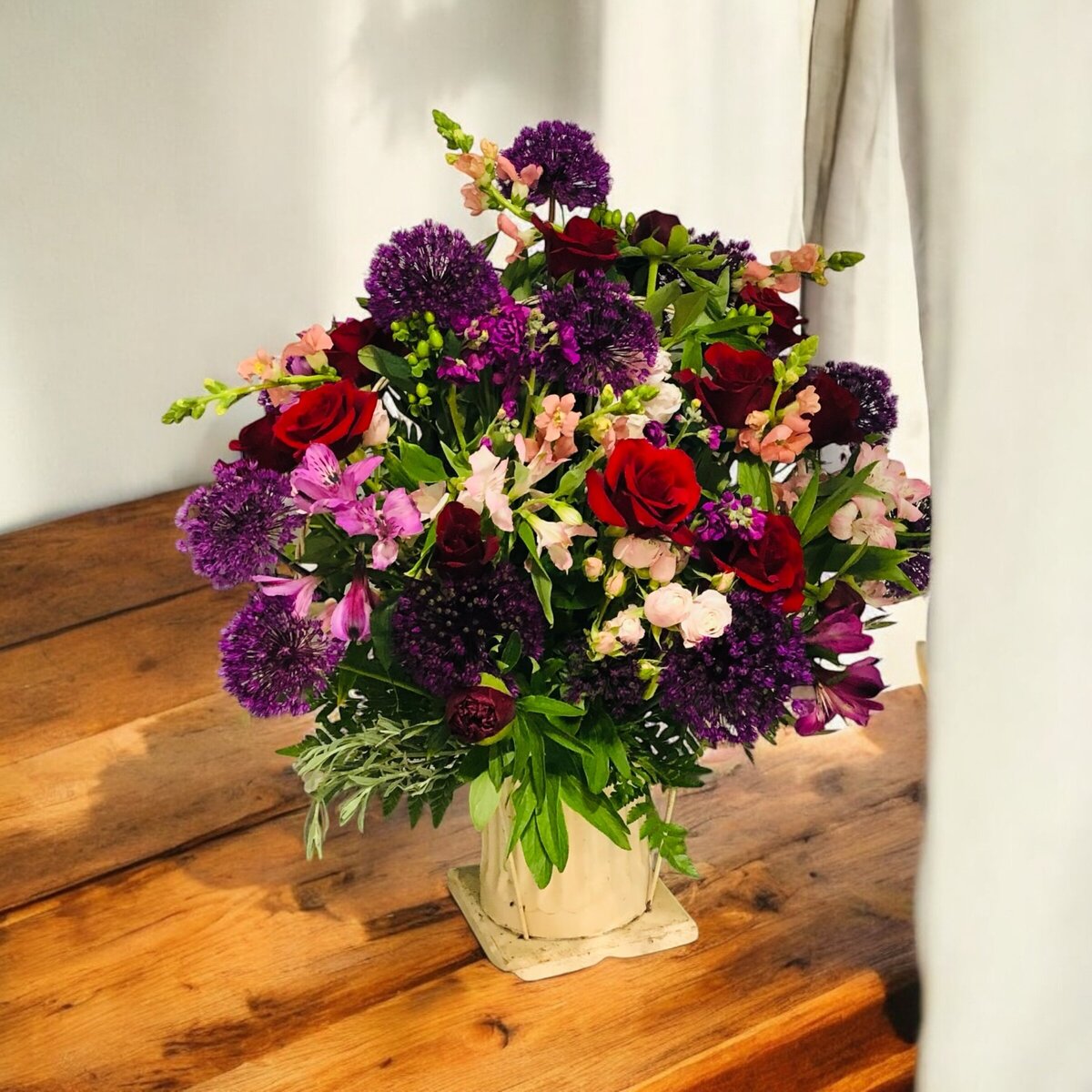 bright funeral side arrangement