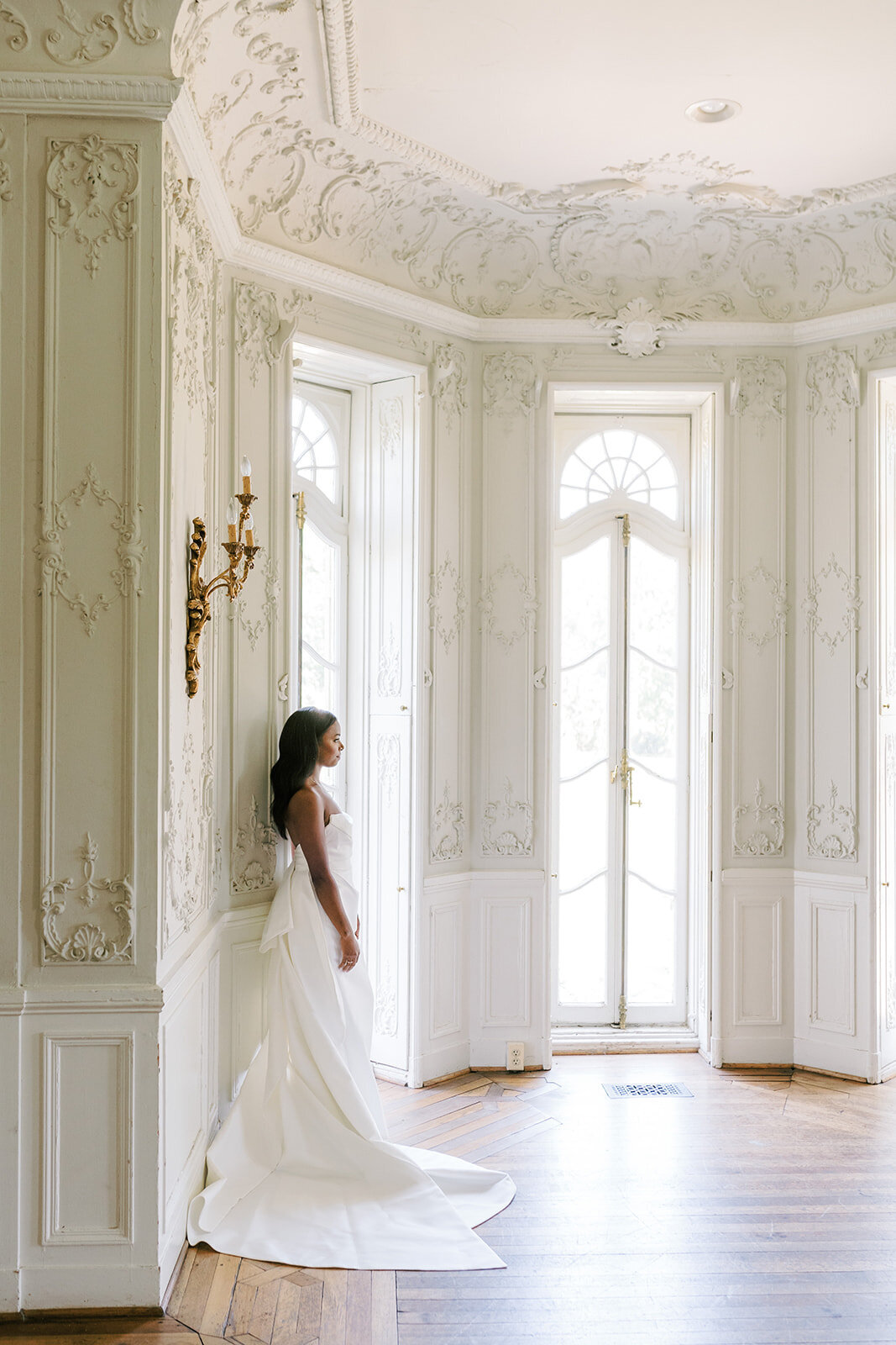 bridal portrait in cylburn arboretum mansion in baltimore white room with windows french