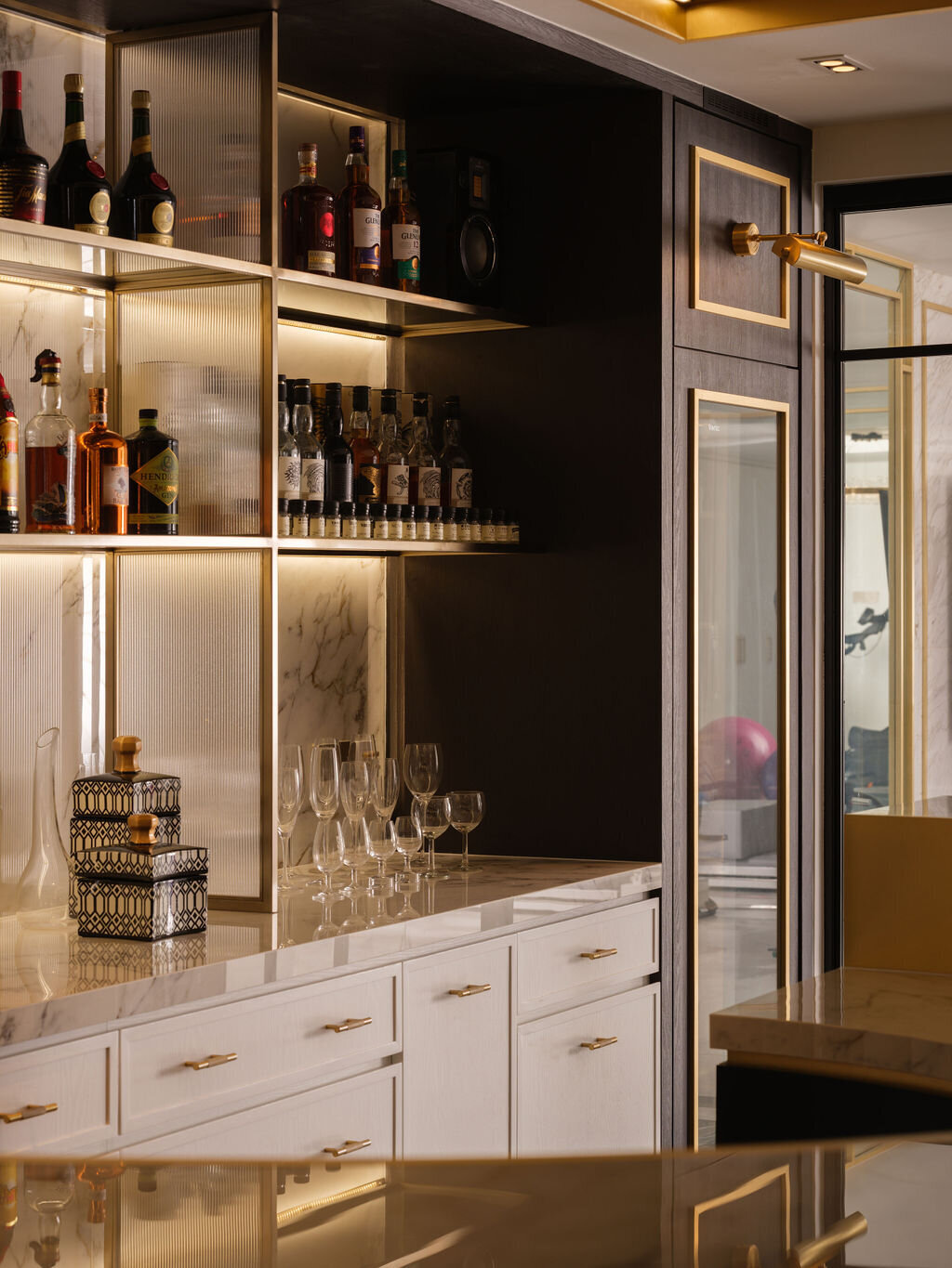 bar nook area with bottles of alcohol