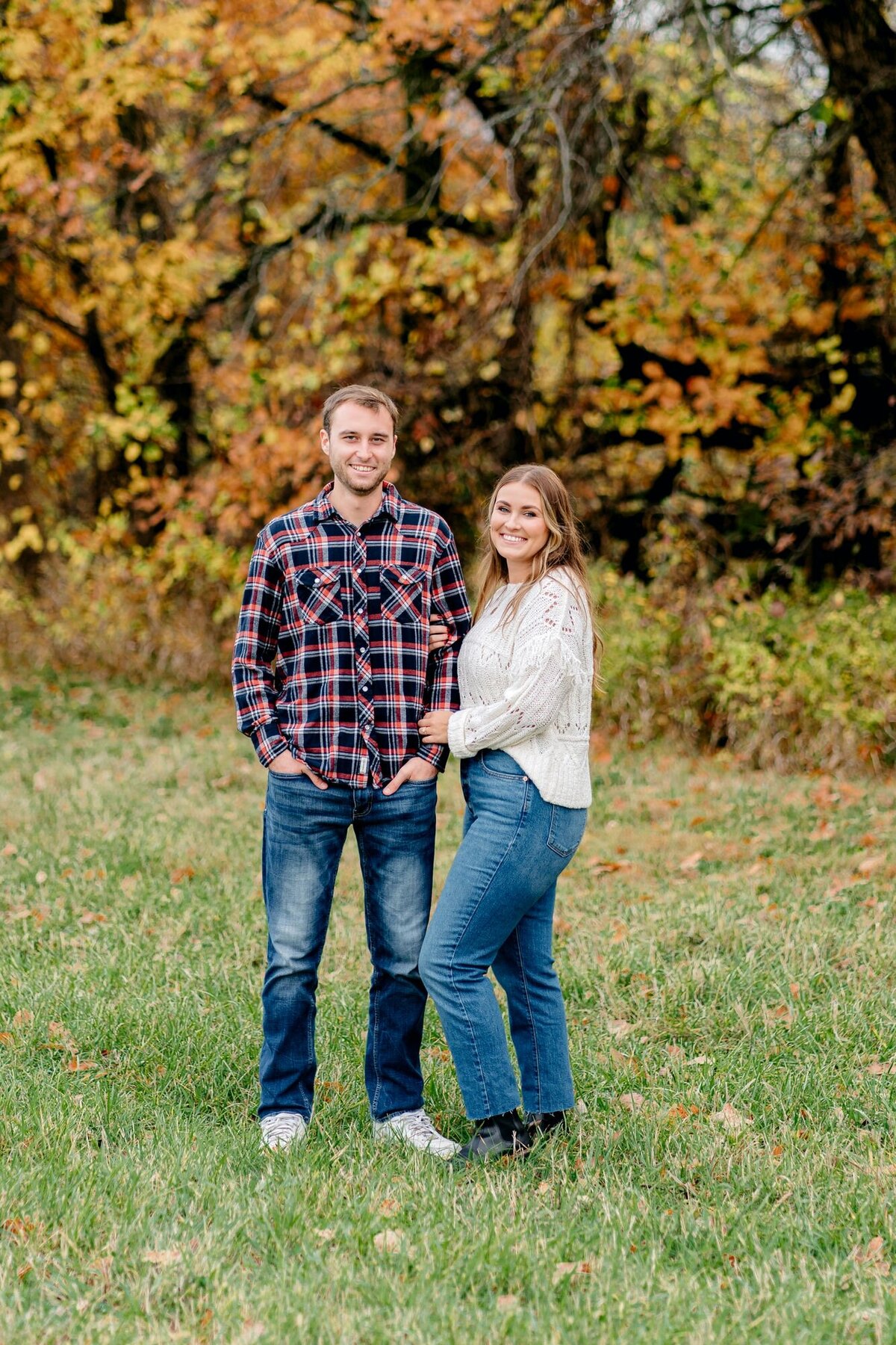 couple-smiling-fall-engagement