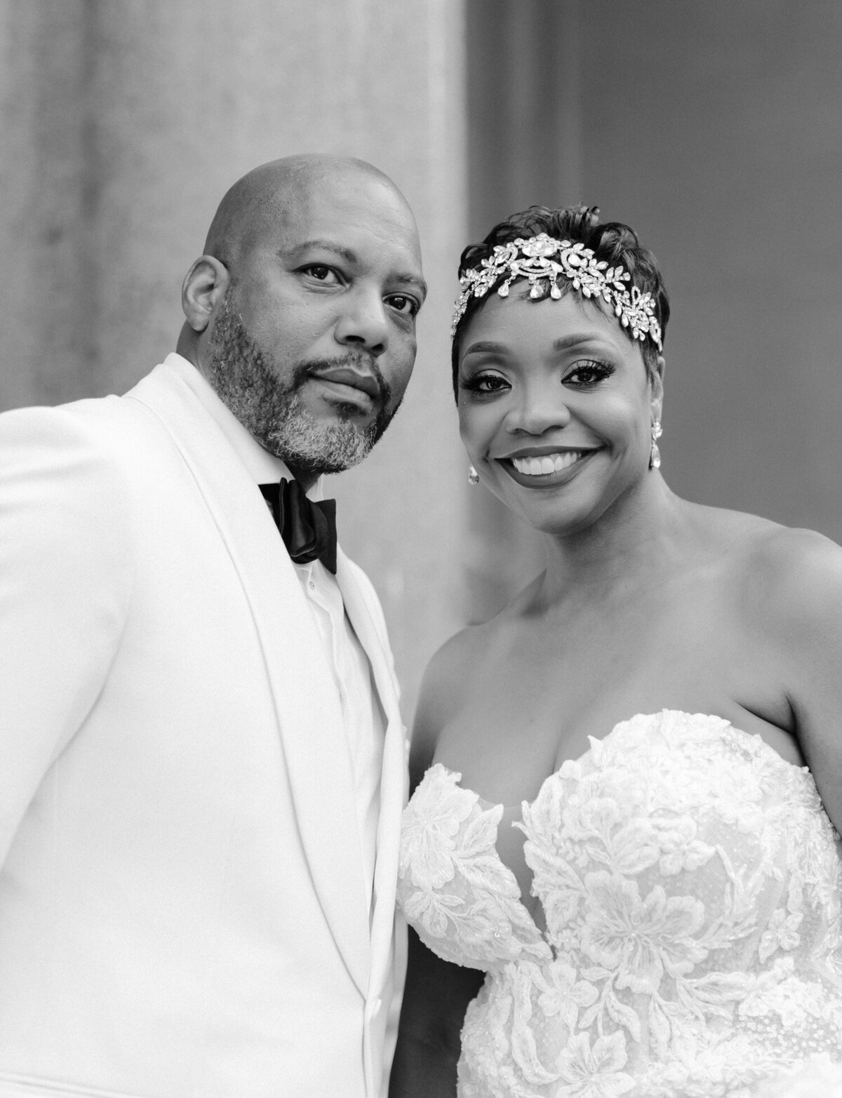 black bride and groom Detroit wedding, crystal bridal headpiece, white groom tux