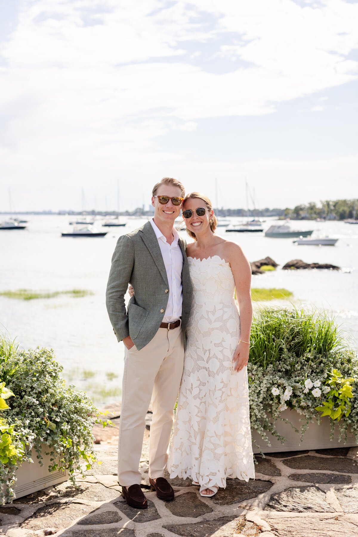 couple at sunset on the lawn of American Yacht Club in Rye, NY 