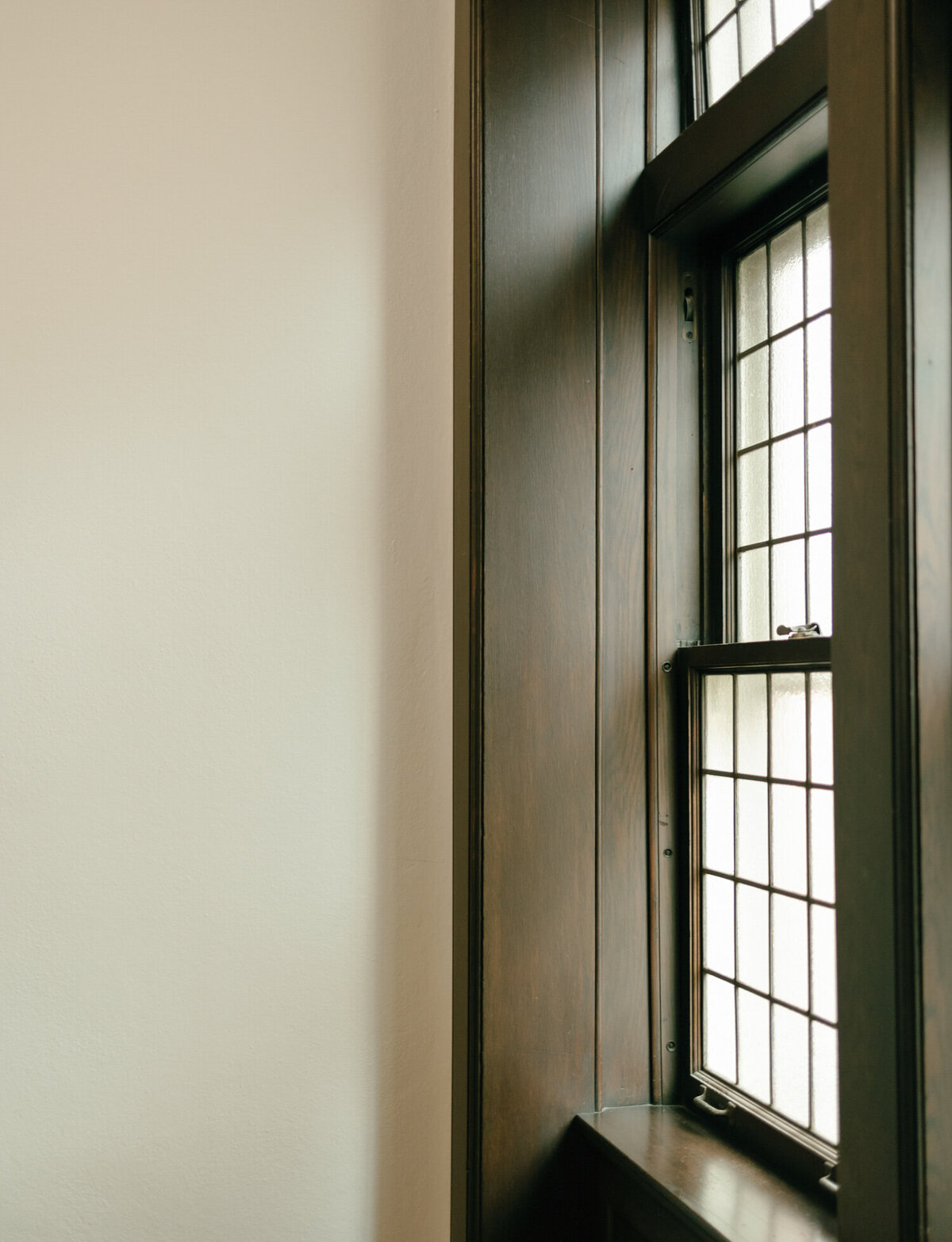 mahogany wood trim window details, interior design brand photo at ALEO Detroit