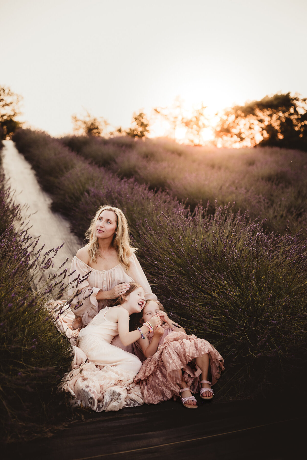 mom and daughters in lavender